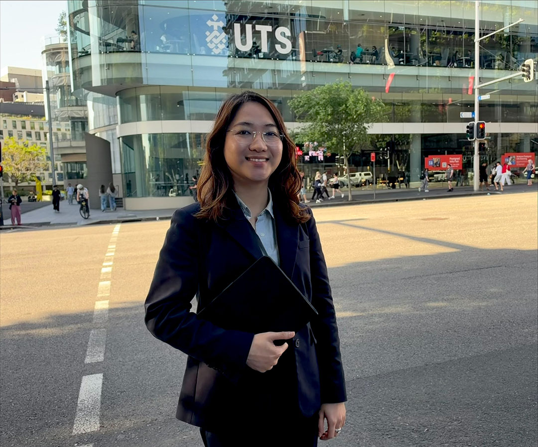 APR.Intern program, UTS PhD researcher Duong (Sunny) Nguyen, in front of a building at UTS